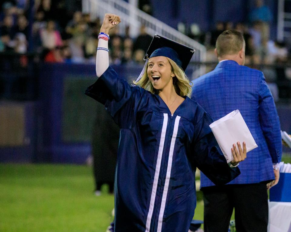 Madison Murphy celebrates after receiving her diploma during the Class of 2022 graduation ceremony at Rockland High School on Friday, June 3, 2022.