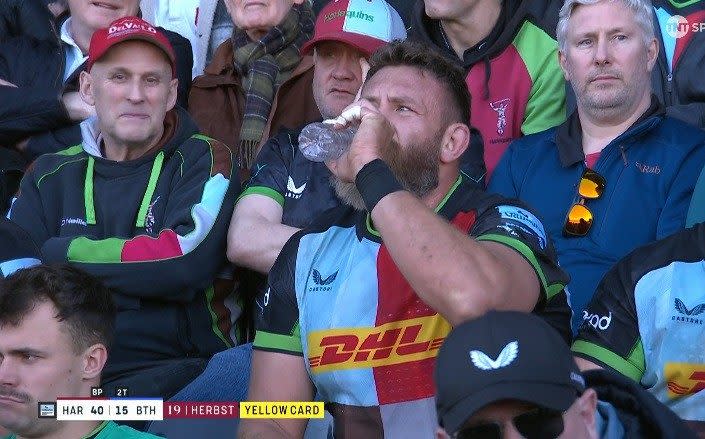 The South African lock enjoys a drink while serving his sentence in the sin bin...