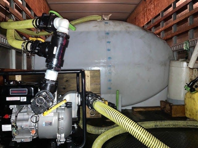 A pump and a large tank inside the box truck. The Flagler County Sheriff's Office has seized the truck, which deputies stated was being used to take cooking oil from behind Woody's in Palm Coast.