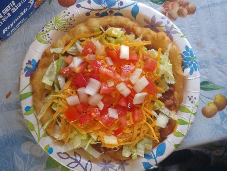 <p><a href="https://www.thedailymeal.com/cook/navajo-frybread-recipe-pinterest-trend-coronavirus?referrer=yahoo&category=beauty_food&include_utm=1&utm_medium=referral&utm_source=yahoo&utm_campaign=feed" rel="nofollow noopener" target="_blank" data-ylk="slk:Fry bread;elm:context_link;itc:0;sec:content-canvas" class="link ">Fry bread</a> is actually the official state bread of South Dakota. You can find this fluffy, flat, slightly chewy bread with a golden-brown crust all throughout the region, and tis traditional Native American food is a huge part of the culinary culture in South Dakota. The two most popular variations are sweet, with cinnamon and sugar; and a “Fry bread taco,” topped with ground beef, refried beans, lettuce, tomatoes and sour cream.</p>