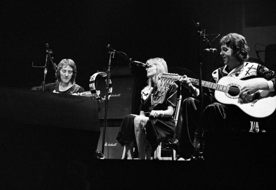 Paul McCartney, right, and Wings, including, Linda McCartney, and Denny Laine, left, sat for a string of acoustic songs, including the Beatles classics “I’ve Just Seen a Face,” “Blackbird,” and “Yesterday” during the “Wings Over America” tour, which opened May 3, 1976 at the Tarrant County Convention Center.