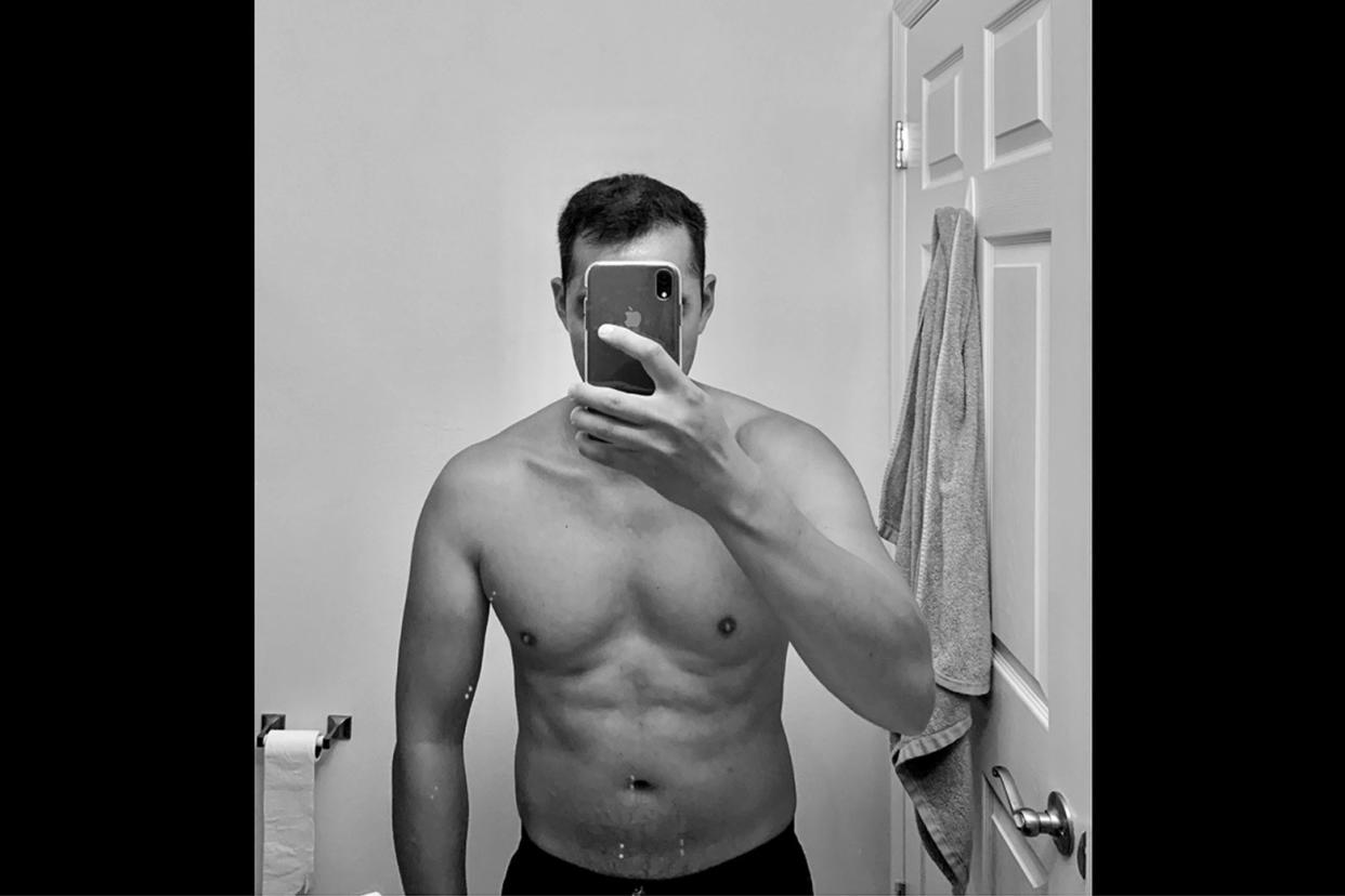 The "thirst trap" photo in question is a black and white photo of a shirtless man in a mirror with his phone obscuring his face. 