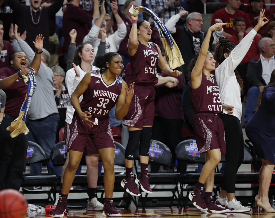 FILE - In this Monday, March 25, 2019, file photo, Missouri State forward Jasmine Franklin, left, guard Sydney Wilson, center, and guard Mya Bhinhar, right, celebrate a 3-point basket by guard Sydney Manning during the second half against Iowa State in the second round of the NCAA women's college basketball tournament, in Ames, Iowa. In the first week of December 2019, Missouri State is ranked for the first time in 15 years. Franklin, Wilson and Bhinhar are returning players from a squad that reached last season's Sweet 16. (AP Photo/Matthew Putney, File)