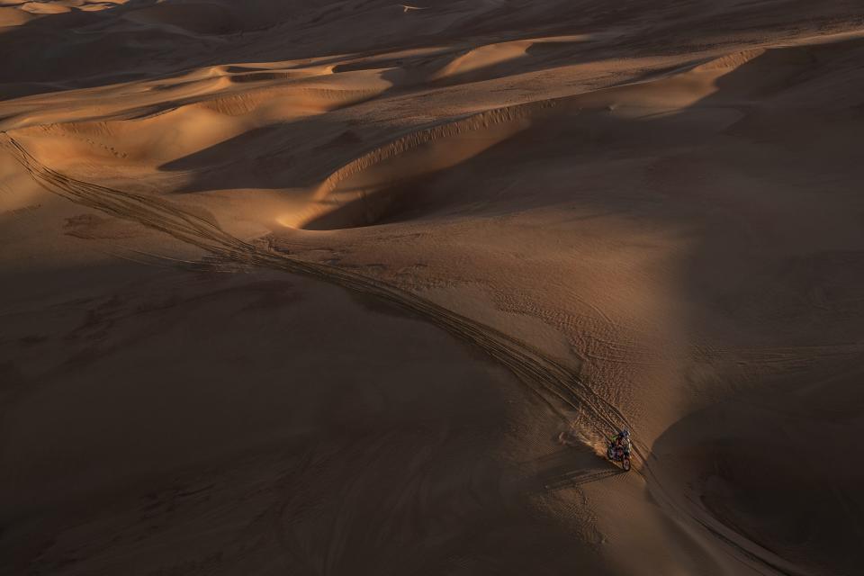 Matthias Walkner of Austria rides his KTM motorbike during stage eleven of the Dakar Rally between Shubaytah and Haradth, Saudi Arabia, Thursday, Jan. 16, 2020. (AP Photo/Bernat Armangue)