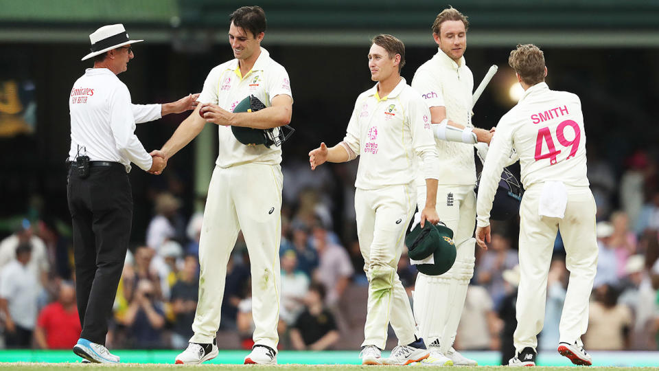 Pat Cummins, pictured here shaking hands with umpire Paul Reiffel after the fourth Ashes Test.