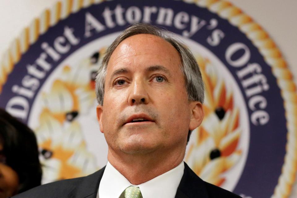 Texas Attorney General Ken Paxton speaks at a news conference in 2017.