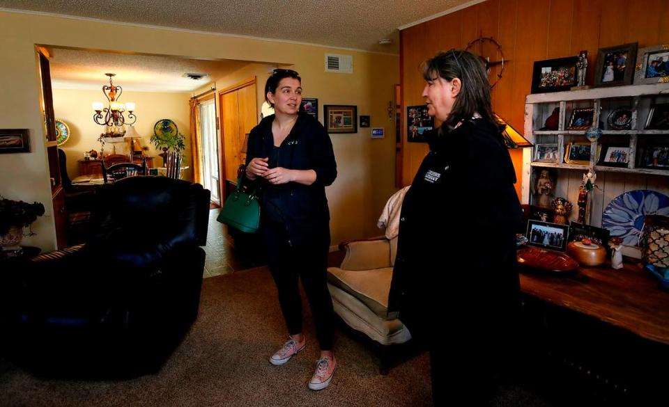 Broker Shannon Jones, right, with Berkshire Hathaway HomeServices, talks with Richland resident Megan Simpson during a recent open house. Open houses are growing in popularity since the pandemic.