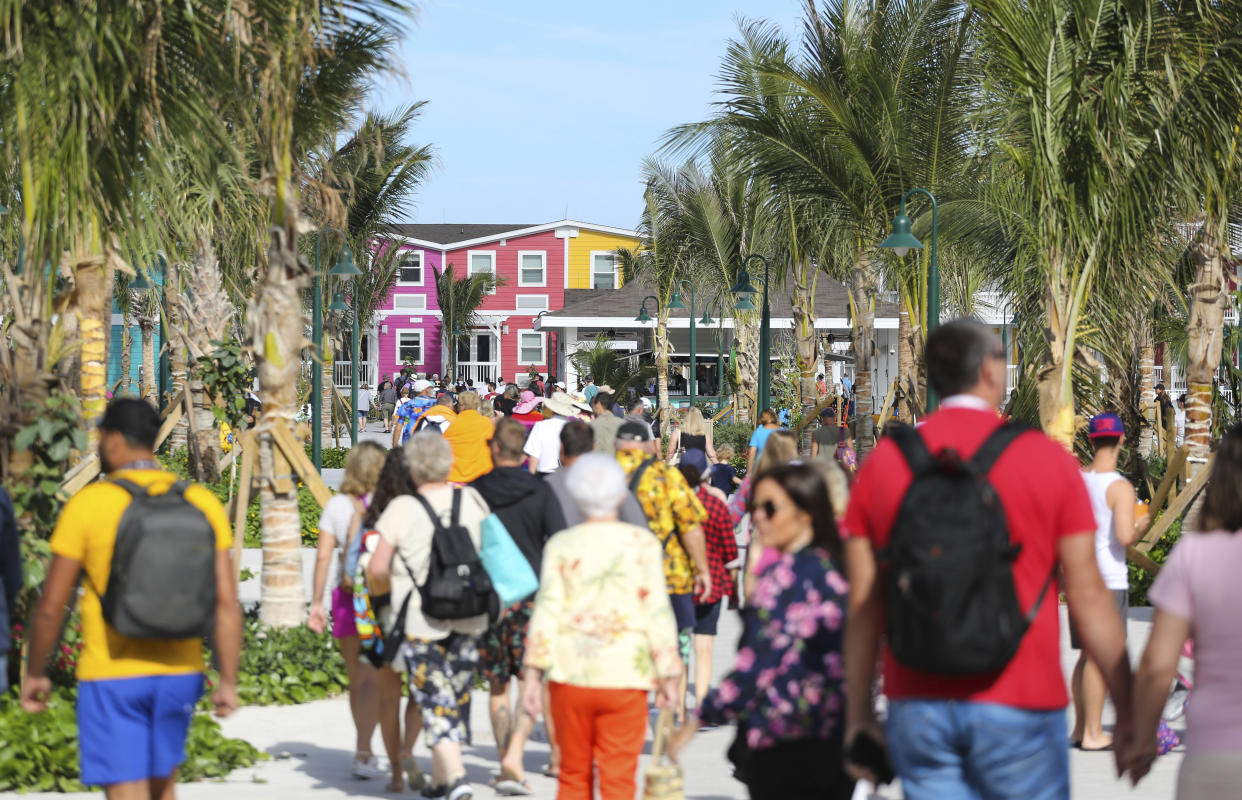 Guests make their way through the welcome plaza to discover Ocean Cay MSC Marine Reserve, Thursday, Dec. 5, 2019 in Marine Cay Island, The Bahamas. (James McEntee/MSC Cruises via AP Images)