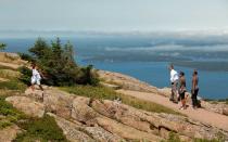 <p>Obama hikes along Cadillac Mountain with his family at Acadia National Park in Maine.</p>