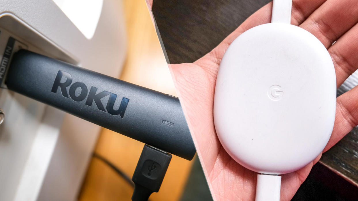  The Roku Streaming Stick 4K plugged into the back of a TV and the Chromecast with Google TV in a hand. 