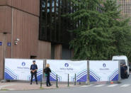 Police officers stand at the entrance of the Park Maximilien in Brussels, Belgium, September 17, 2018. REUTERS/Francois Walschaerts