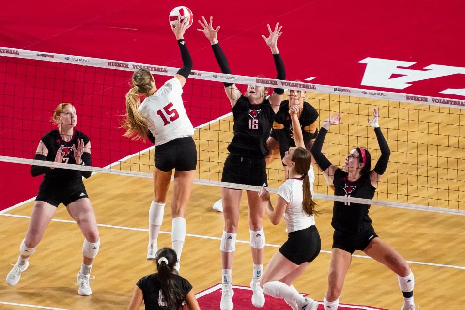 Nebraska Cornhuskers middle blocker Andi Jackson (15) attacks the ball during the third set against the Omaha Mavericks.