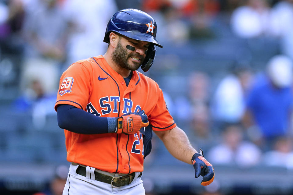 Houston Astros' Jose Altuve reacts after he was hit by a pitch during the first inning of the team's baseball game against the New York Yankees on Thursday, June 23, 2022, in New York. (AP Photo/Frank Franklin II)