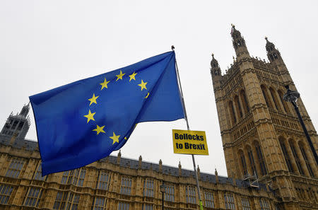 A European Union flag with an anti-Brexit banner is flown outside of the Houses of Parliament in London, Britain, January 10, 2019. REUTERS/Toby Melville
