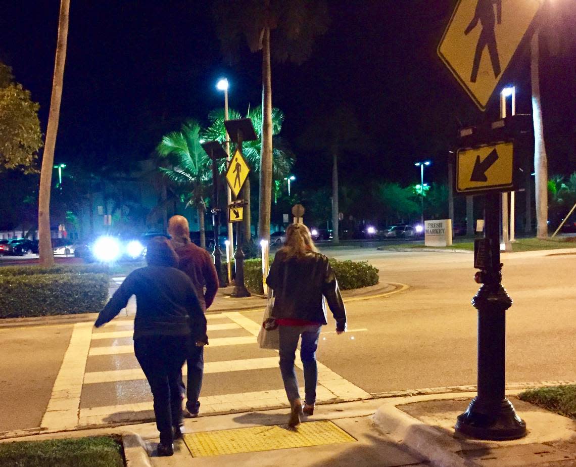 Pedestrians attempt the often hazardous crossing of South Bayshore Drive in Coconut Grove. Florida ranks as the second most dangerous state in the nation for pedestrians and Miami is 14th among the most dangerous cities.