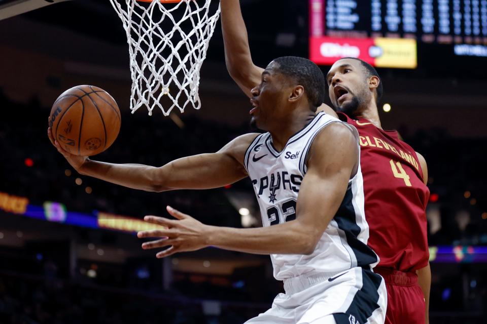 Spurs guard Malaki Branham shoots against Cavaliers forward Evan Mobley on Monday. Branham finished with 18 points.