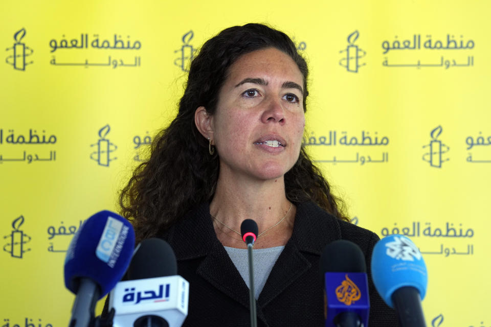Amnesty International's Director for the Middle East and North Africa Heba Morayef, speaks during a press conference in Beirut, Lebanon, Tuesday, March 28, 2023. The leading international rights group on Tuesday decried what it said were double standards by Western countries, which rallied behind a "robust response" to Russia's invasion of Ukraine but remain "lukewarm" on issues of human rights violations in the Middle East. (AP Photo/Bilal Hussein)