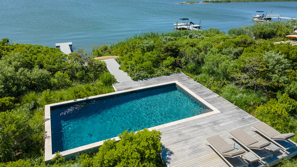 The pool and the path leading down to the private pier. - Credit: Photo: Courtesy of Compass