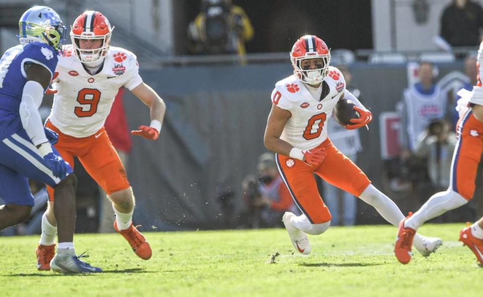 Clemson wide receiver Antonio Williams(0) runs after a catch during the second quarter of the TaxSlayer Gator Bowl at EverBank Stadium in Jacksonville, Florida, Friday, December 29, 2023. Ken Ruinard/USA TODAY NETWORK