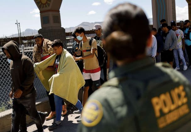 PHOTO:Migrants, mostly from Venezuela, walk after being detained by U.S. Border Patrol agents after crossing into the United States from Mexico to turn themselves in to request for asylum, in El Paso, Texas, Sept. 14, 2022.  (Jose Luis Gonzalez/Reuters)
