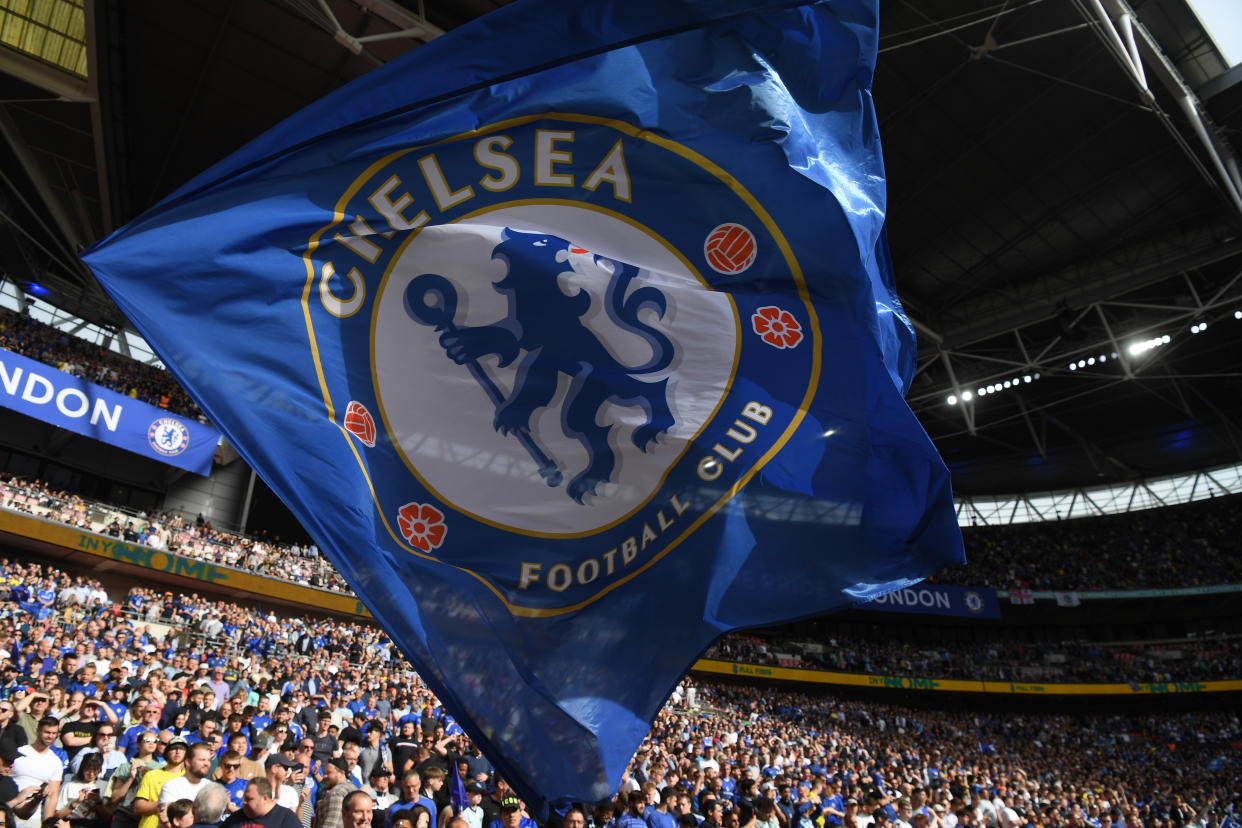 Chelsea fans wave flags prior to The FA Cup Semi-Final match between Chelsea and Crystal Palace at Wembley Stadium on April 17, 2022 in London, England. (Photo by Mike Hewitt/Getty Images)