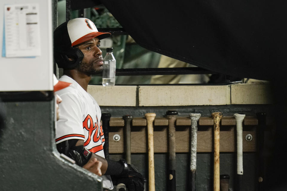 Baltimore Orioles' Cedric Mullins looks on from the dugout during the ninth inning of a baseball game against the New York Yankees, Tuesday, Sept. 14, 2021, in Baltimore. (AP Photo/Julio Cortez)