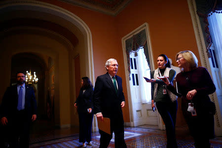U.S. Senate Majority Leader Mitch McConnell walks to the Senate chamber on Capitol Hill in Washington, U.S. February 7, 2018. REUTERS/Eric Thayer