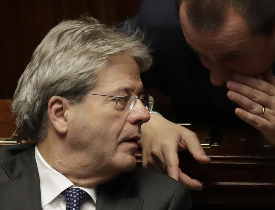 Italian Prime Minister Paolo Gentiloni sits in the parliament after giving his first speech as premier at the lower house where he will later face a confidence vote, in Rome Tuesday, Dec. 13, 2016. Paolo Gentiloni, a Democrat formerly serving as foreign minister, formed Italy’s new government Monday, keeping several key ministers from the coalition of Matteo Renzi, who resigned last week. (AP Photo/Alessandra Tarantino)