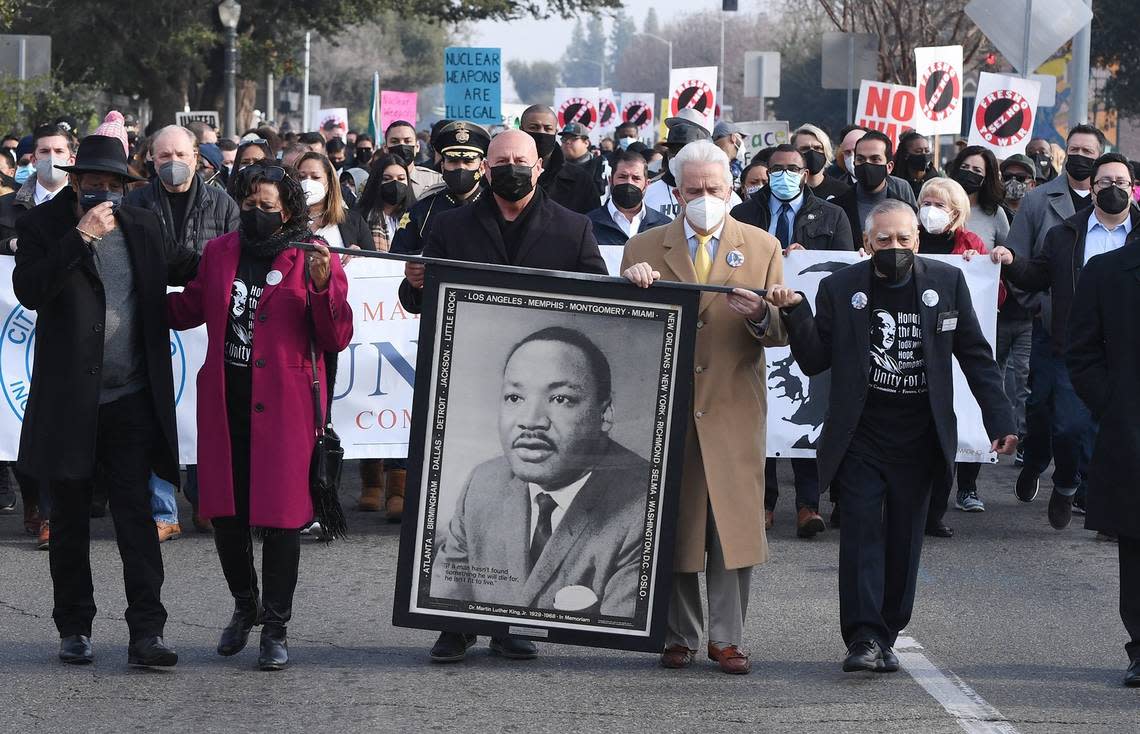 An estimated 300 people joined together for the annual MLK march from St. John’s Cathedral to the Fresno Memorial Auditorium Monday morning, Jan. 17, 2022 in downtown Fresno.