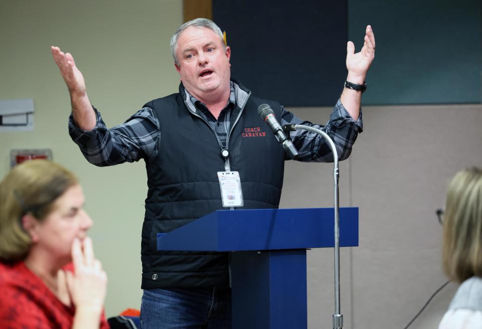 Teacher and coach Cliff Canavan speaks during a special Brockton School Committee meeting at the Arnone School on Wednesday, Jan. 31, 2024, about safety and security. Canavan said his arm was broken by a student when he broke up a fight last year.