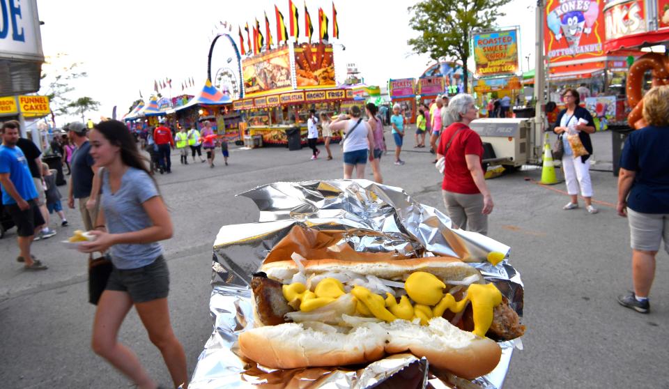 Fair food, like this Italian sausage, is part of the experience at the 2018 Wilson County FairFriday Aug. 17, 2018, in Lebanon, Tenn.