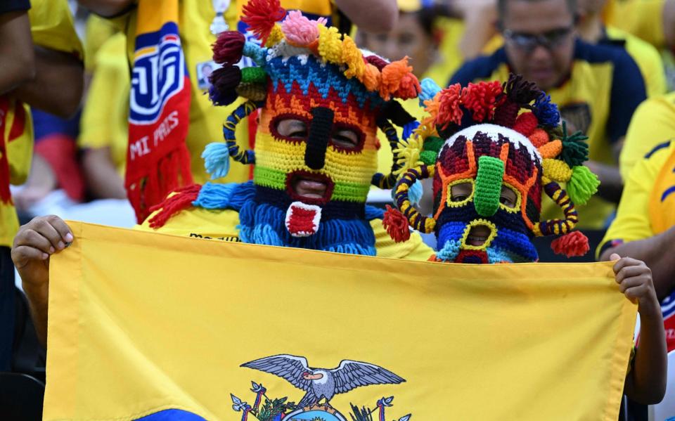 Fans of Ecuador's team pose for a picture ahead of the Qatar 2022 World Cup Group A football match between Qatar and Ecuador at the Al-Bayt Stadium in Al Khor - Getty Images/Raul Arboleda