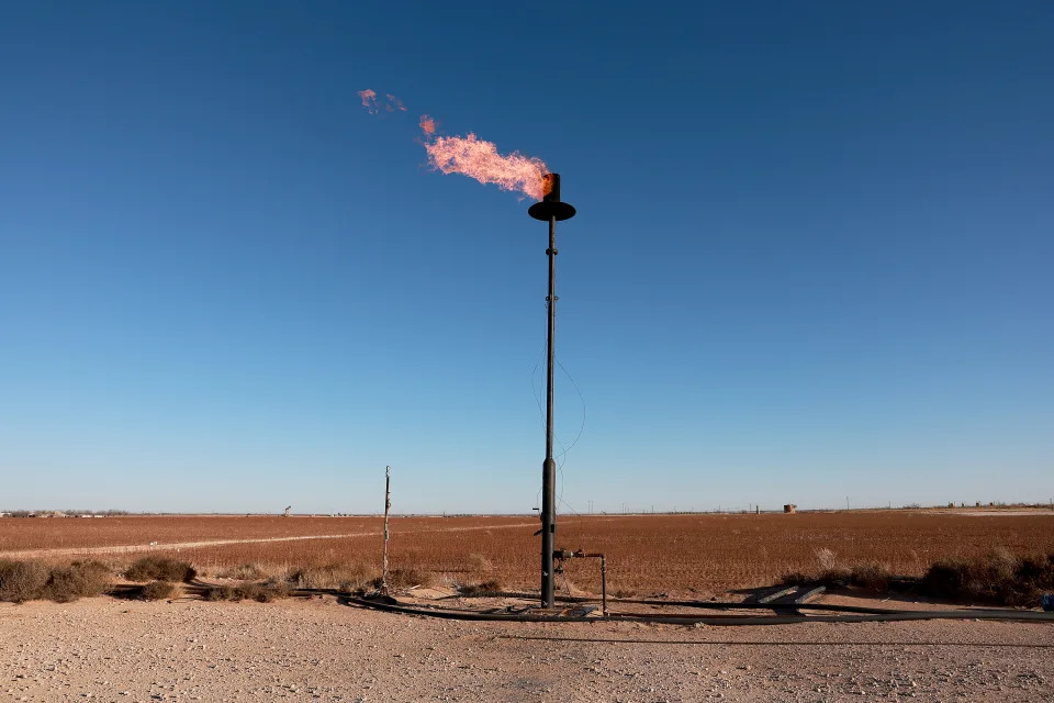 Natural gas is flared off during an oil drilling operation in Stanton, Texas
