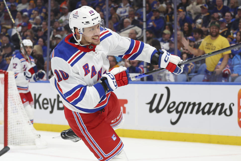 New York Rangers left wing Artemi Panarin (10) celebrates after his goal during the second period of an NHL hockey game against the Buffalo Sabres, Thursday, Oct, 12, 2023, in Buffalo, N.Y. (AP Photo/Jeffrey T. Barnes)