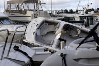 Boats are piled on each other at the Southport Marina following the effects of Hurricane Isaias in Southport, N.C., Tuesday, Aug. 4, 2020. (AP Photo/Gerry Broome)