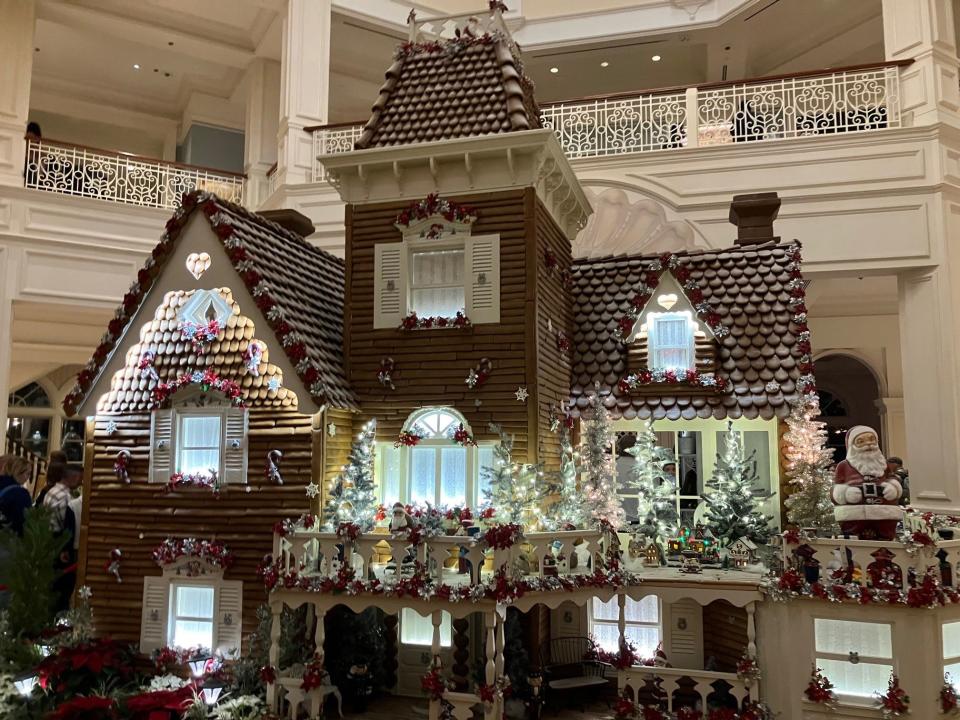 The long-popular and life-size gingerbread house at the Grand Floridian Resort and Spa at Walt Disney World goes up in the resort lobby every November. It boasts 1,050 pounds of honey, 140 pints of egg whites, 600 pounds of powdered sugar, 700 pounds of chocolate, 800 pounds of flour and 35 pounds of spices.