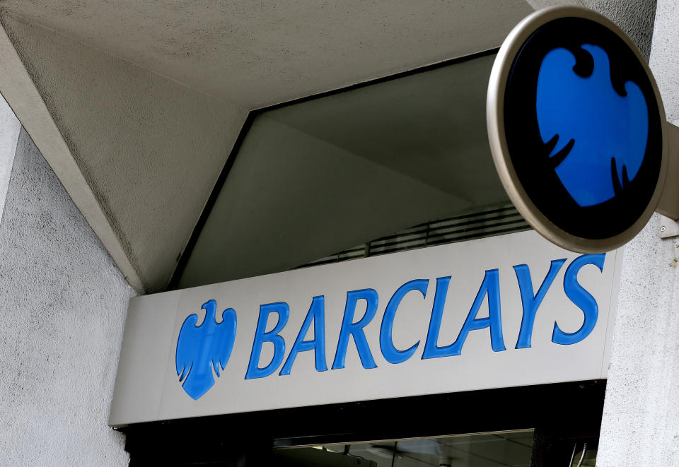 FILE - This July 29, 2015 file photo shows the sign on a branch of Barclays Bank in London. The CEO of Barclays bank, Jes Staley, is being investigated by regulators for his attempts to unmask a whistleblower, the bank said Monday April 10, 2017, who had written anonymous letters raising concerns about a senior employee,. (AP Photo/Kirsty Wigglesworth, File)