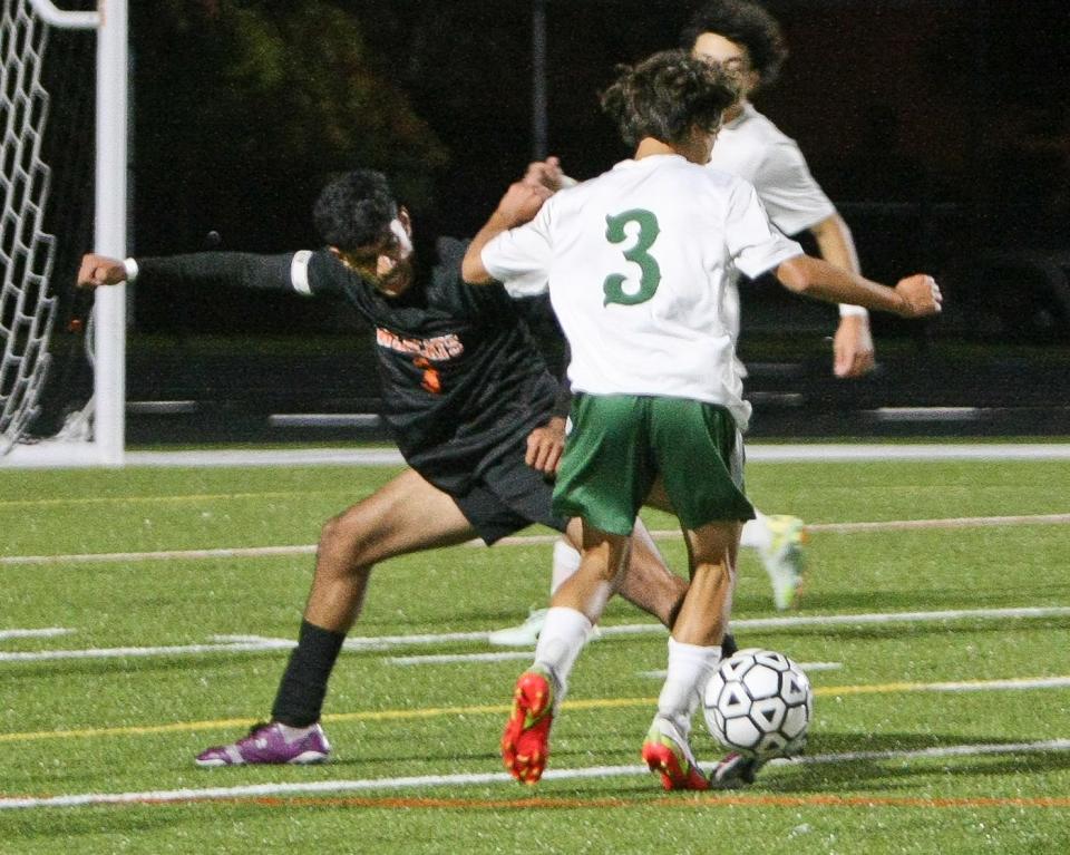 In this TGN file photo, Gardner defenseman Dhruv Patel, left, reaches out to knock the ball away from Oakmont's Vassillios Kakavitsas during a late September game at Watkins Field in Gardner.