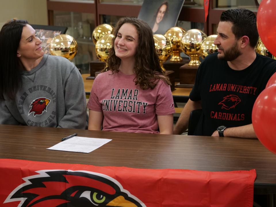 Amarillo High's Jo Moffitt (center) signed her National Letter of Intent to play volleyball for Lamar University on Wednesday, February 22, 2023 at Amarillo High School.