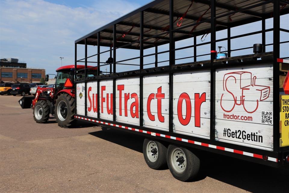 Up to 25 people can ride the SuFu Tractor party trailer at a time. The trailer, which is pulled by a tractor, features a bar on board, and people can buy tickets individually or rent out the whole ride.