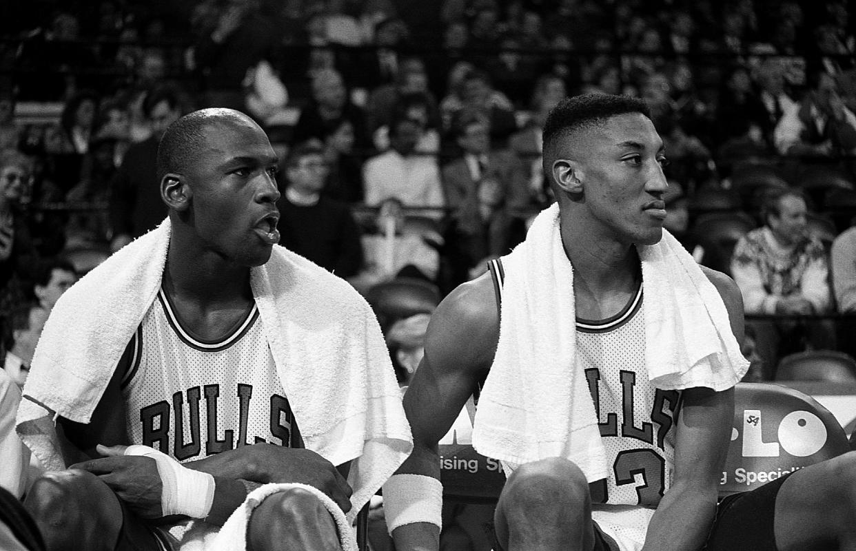 Chicago Bulls basketball stars Michael Jordan and Scottie Pippen sits on the bench during a Chicago Bulls game in 1990