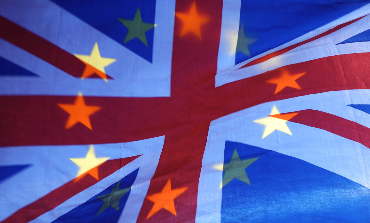 File photo dated 23/04/19 of an EU and Union flag held aloft in Westminster, London. The UK will elect 73 MEPs on May 23, but they could only serve for a few months instead of the usual five years.