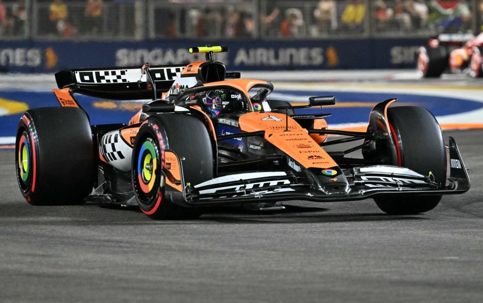 Lando Norris takes pole for Singapore Grand Prix with title rival Max Verstappen second