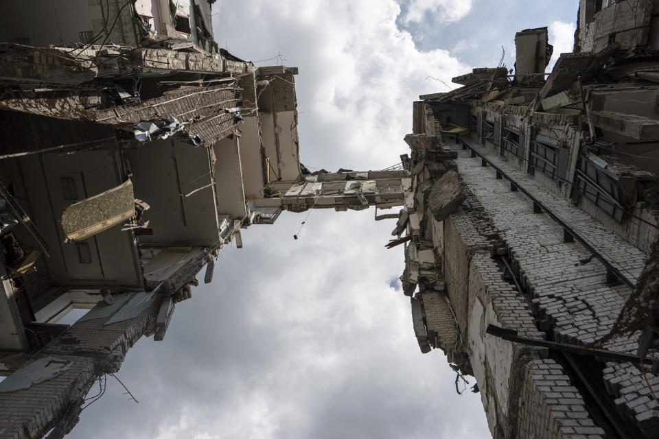 A view of the headquarters of the Mykolaiv Regional Military Administration building destroyed by a Russian attack in Mykolaiv, Ukraine, Friday, Aug. 5, 2022. (AP Photo/Evgeniy Maloletka)