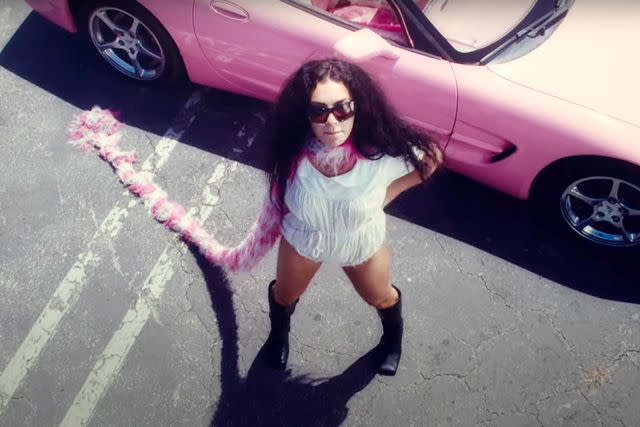 <p>Charli XCX/YouTube</p> Charli XCX in the "Speed Drive" music video