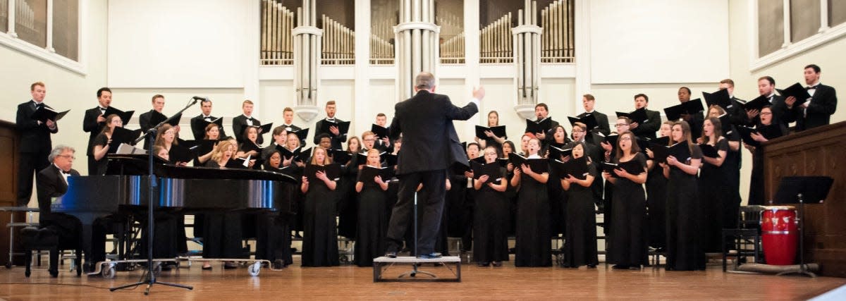 Rowland Blackley conducts the Ashland University Choir during a performance in 2020. The Fall Choral Concert this year will be held Sunday.