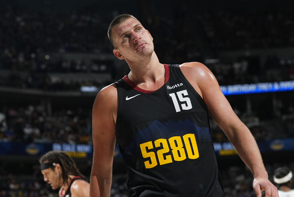 Denver Nuggets center Nikola Jokic reacts after being called for a foul in the second half of Game 7 of an NBA second-round playoff series against the Minnesota Timberwolves Sunday, May 19, 2024, in Denver. (AP Photo/David Zalubowski)