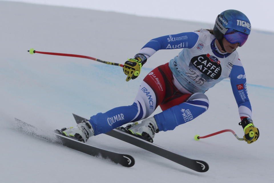 France's Laura Gauche speeds down the course during an alpine ski, women's World Cup downhill race in Crans Montana, Switzerland, Sunday, Feb. 26, 2023. (AP Photo/Alessandro Trovati)