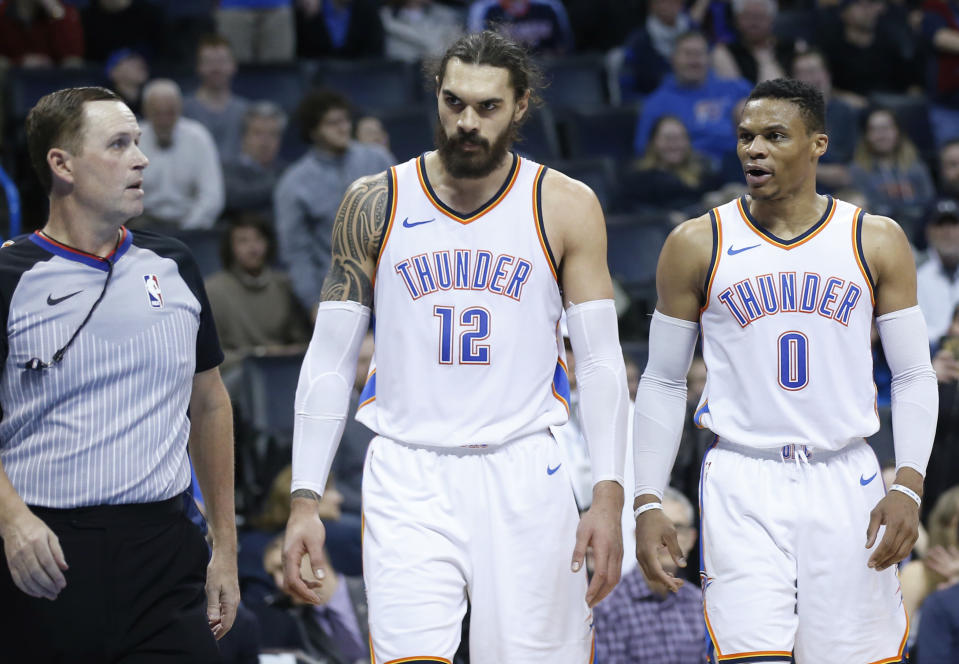 Oklahoma City Thunder guard Russell Westbrook glares through the soul of referee Matt Boland after he whistled the Thunder point guard for a travel in the fourth quarter. (AP)