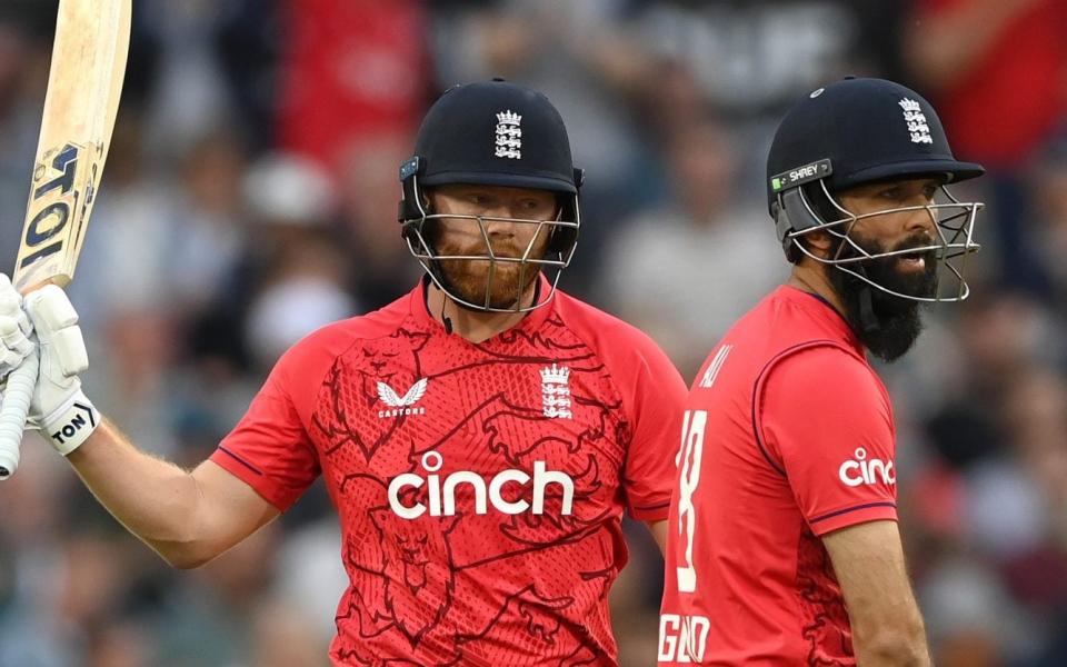 Jonny Bairstow and Moeen Ali look on during  a T20 match between England and South Africa on July 27, 2022